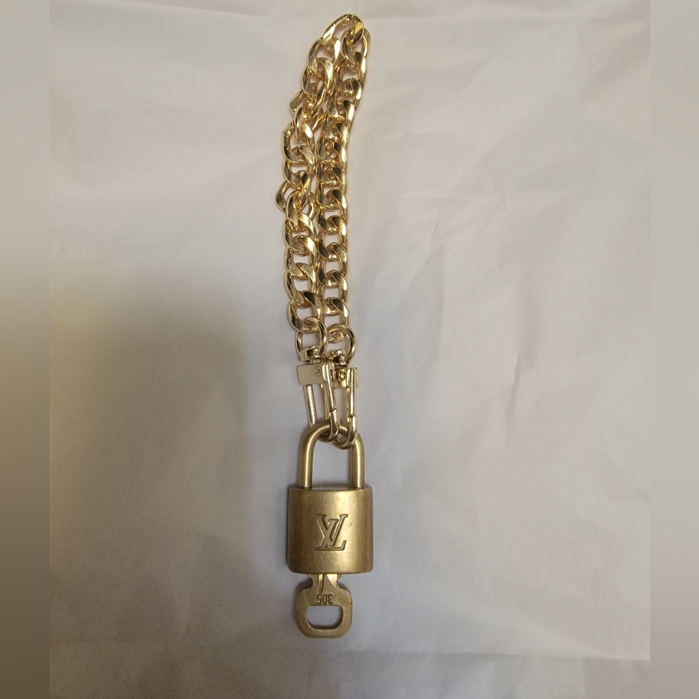Authentic Louise Vuitton lock & key FREE chain